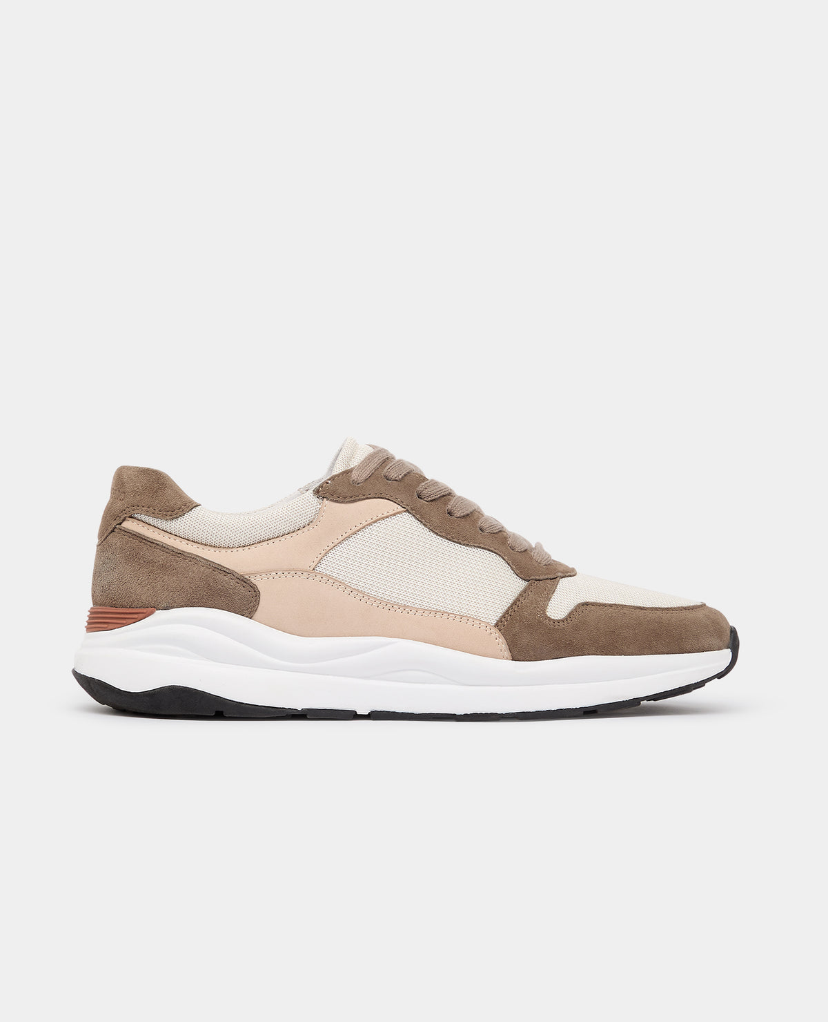 Man wearing a sand Suede Albi Trainer