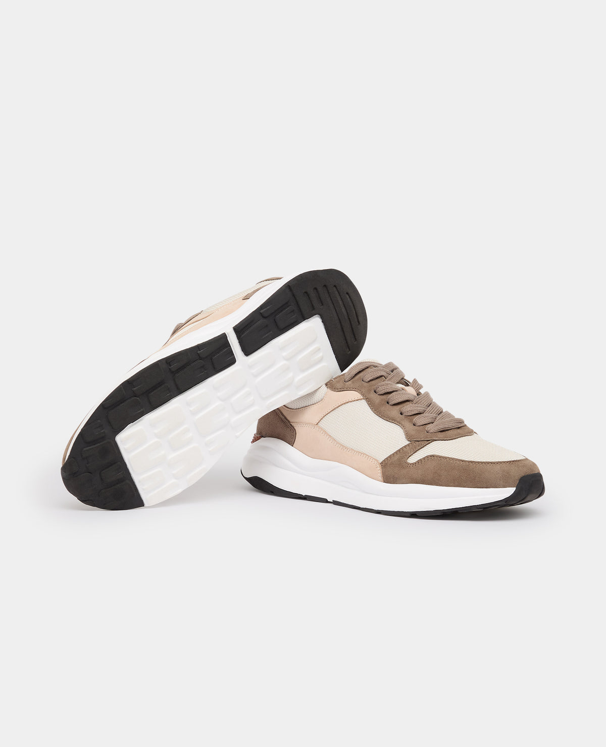 Man wearing a sand Suede Albi Trainer
