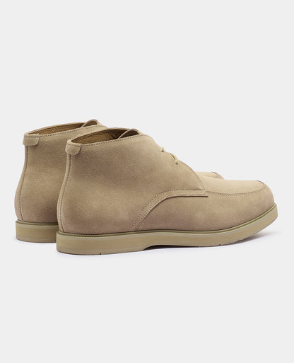 Man wearing a stone Shoe
