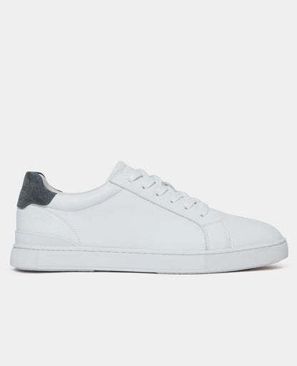 White sneaker with a gray heel on a white background