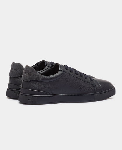 Man wearing a navy Shoe