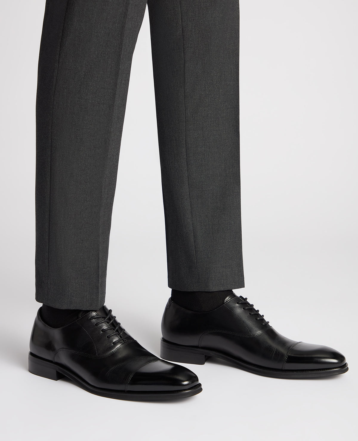 Man wearing a black Leather Garda Shoe