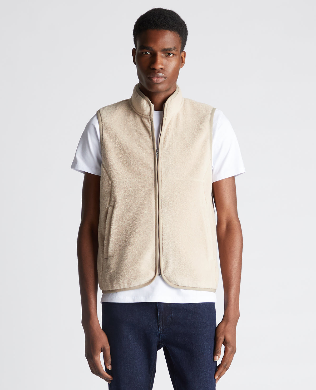 Man wearing a sand Slim Fit Gilet Fleece