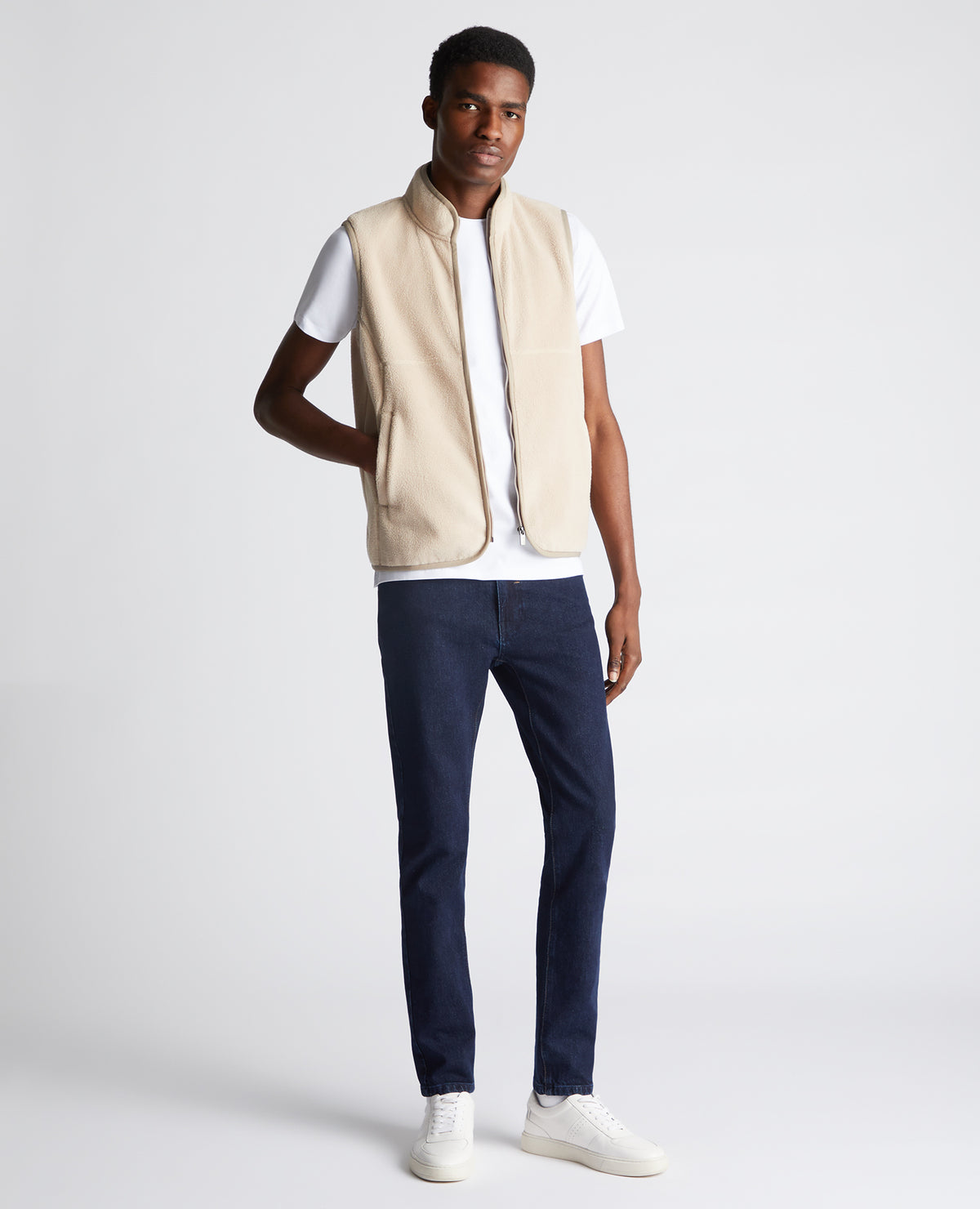 Man wearing a sand Slim Fit Gilet Fleece