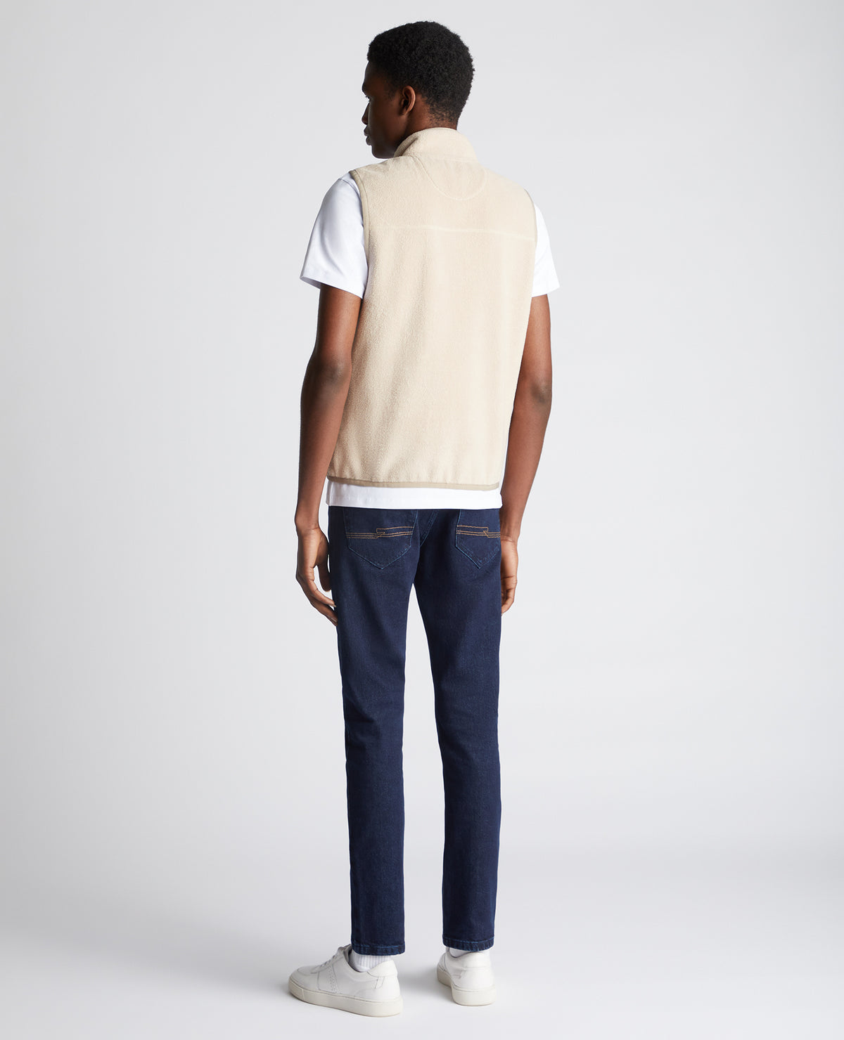Man wearing a sand Slim Fit Gilet Fleece