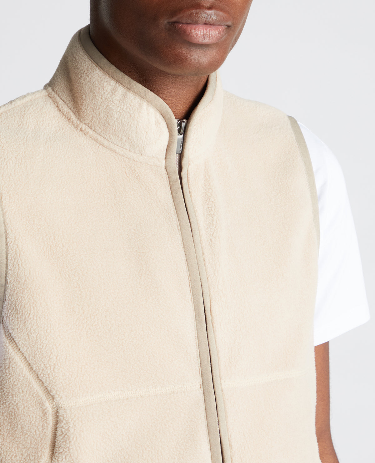 Man wearing a sand Slim Fit Gilet Fleece