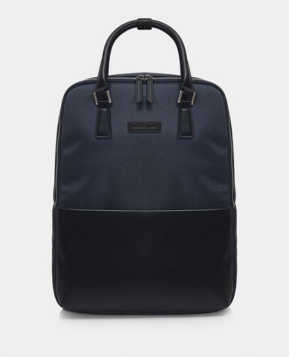 Man wearing a blue Leather-Trimmed Backpack